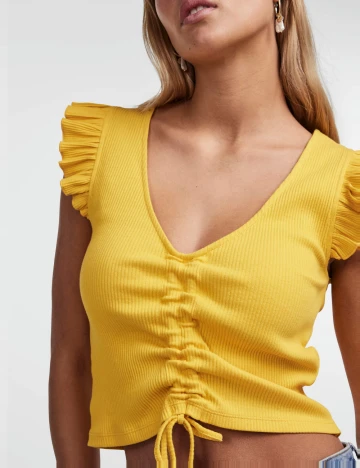 Top Pieces, galben