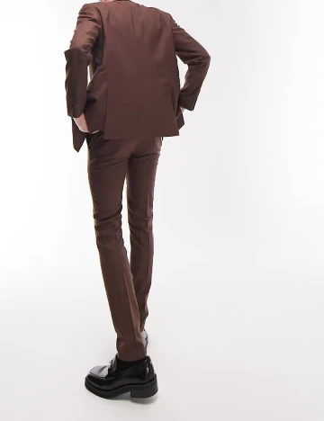 Sacou Topman, maro